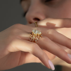 The Halo Twig Set With A 4 Carat Pear Moissanite