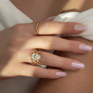 The Halo Twig Set With A 4 Carat Pear Moissanite
