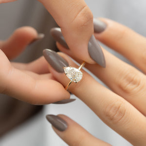 The Sarah Set With A 1 Carat Pear Moissanite