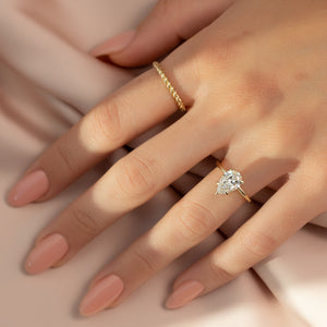 The Sarah Set With A 1 Carat Pear Moissanite
