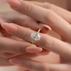 The Pave Sarah Set With A 1.5 Carat Oval Lab Diamond