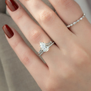 The Stephanie Set With A 2.5 Carat Pear Moissanite