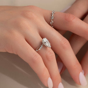 The Daisy Set With A 1.5 Carat Pear Moissanite