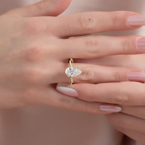 The Daisy Set With A 4.5 Carat Pear Moissanite