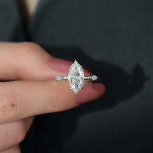 The Nicole Set With A 1.5 Carat Marquise Moissanite