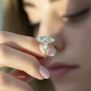 The Three Stone Twig Set With A 1.5 Carat Marquise Lab Diamond