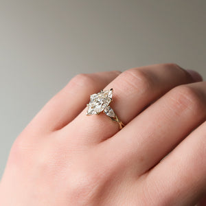 The Three Stone Twig Set With A 1.5 Carat Marquise Lab Diamond