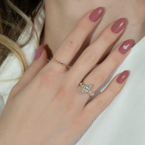 The Nova Set With A 1.5 Carat Marquise Lab Diamond
