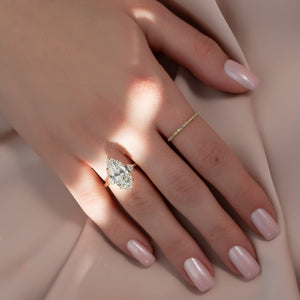 The Hearts Liv Set With A 1 Carat Marquise Moissanite