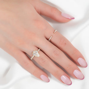 The Pave Lisa Set With A 1.5 Carat Pear Lab Diamond