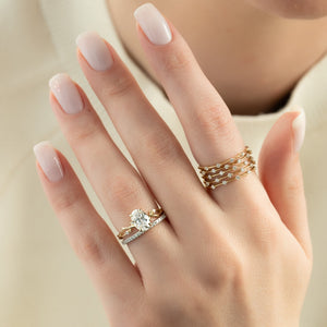 The Twig Set With A 4 Carat Oval Moissanite