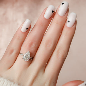 The Twig Set With A 4 Carat Pear Moissanite