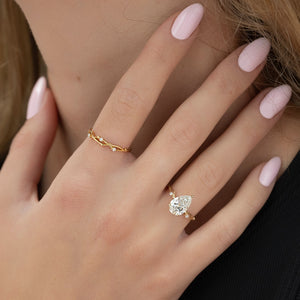 The Twig Set With A 4 Carat Pear Moissanite