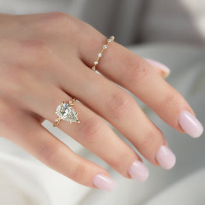 The Twig Set With A 4 Carat Pear Moissanite