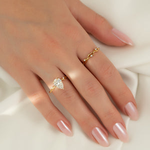The Twig Set With A 4 Carat Pear Moissanite