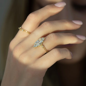 The Textured Twig Set With A 1.5 Carat Marquise Lab Diamond