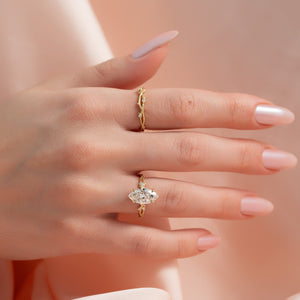 The Textured Twig Set With A 1.5 Carat Marquise Lab Diamond