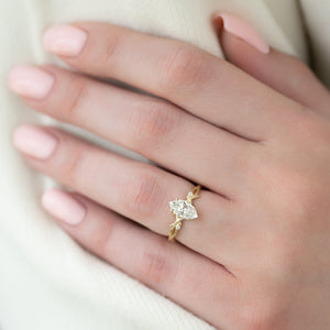 The Textured Twig Set With A Marquise Lab Diamond