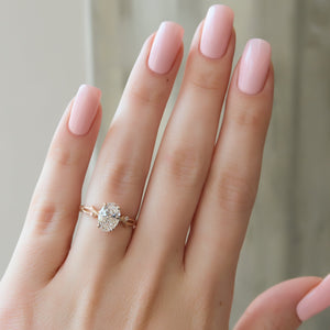 The Textured Twig Set With A 2 Carat Oval Lab Diamond
