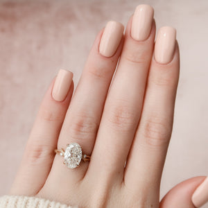 The Textured Twig Set With A Oval Moissanite