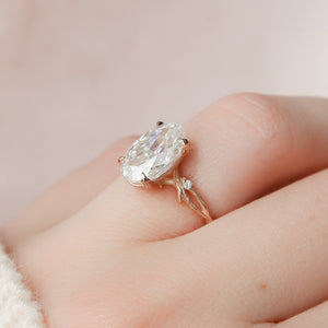 The Textured Twig Set With A Oval Moissanite
