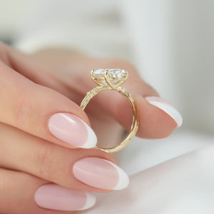 The Textured Twig Set With A 3 Carat Oval Lab Diamond