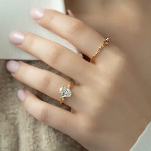 The Textured Twig Set With A 3 Carat Oval Lab Diamond