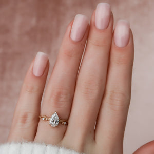 The Textured Twig Set With A 3 Carat Pear Lab Diamond