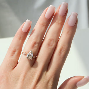 The Textured Twig Set With A 3 Carat Pear Lab Diamond
