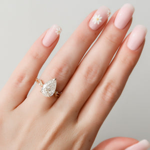 The Textured Twig Set With A 3 Carat Pear Lab Diamond