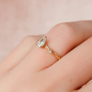 The Textured Twig Set With A 3 Carat Pear Lab Diamond