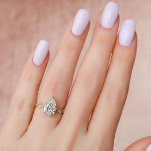 The Textured Twig Set With A Pear Lab Diamond