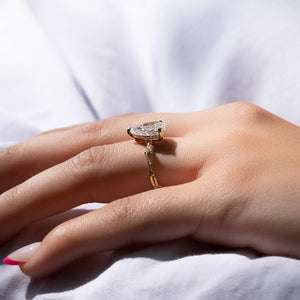 The Textured Twig Set With A Pear Lab Diamond