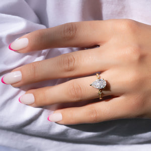 The Textured Twig Set With A Pear Lab Diamond
