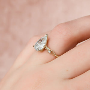 The Textured Twig Set With A Pear Lab Diamond
