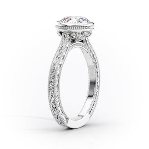 The Bezel Sierra Set With A 2 Carat Cushion Moissanite