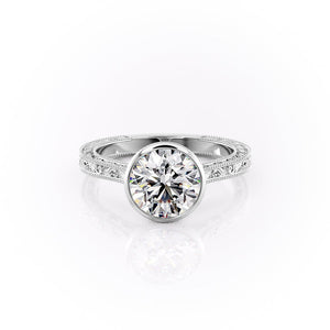The Bezel Sierra Set With A 2 Carat Round Moissanite