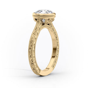 The Bezel Sierra Set With A 2 Carat Round Moissanite