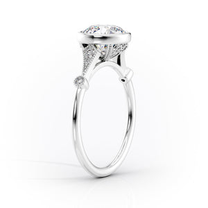 The Bezel Amber Set With A 1 Carat Marquise Moissanite