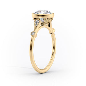 The Bezel Amber Set With A 1 Carat Oval Moissanite