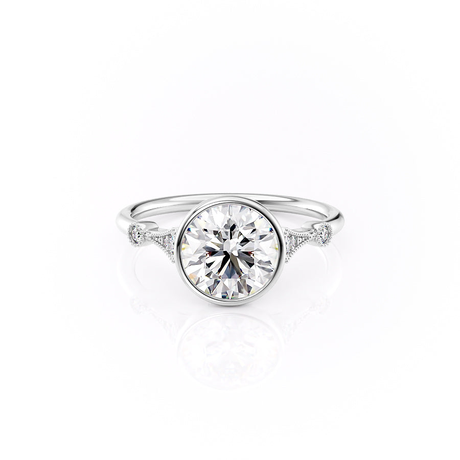 The Bezel Amber Set With A 1.5 Carat Round Moissanite