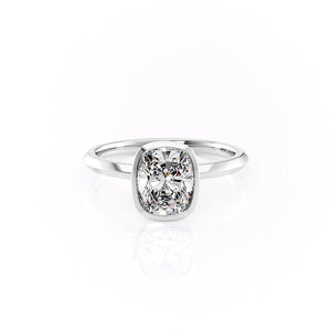 The Razor Bezel Kamellie Set With A 1 Carat Elongated Cushion Moissanite