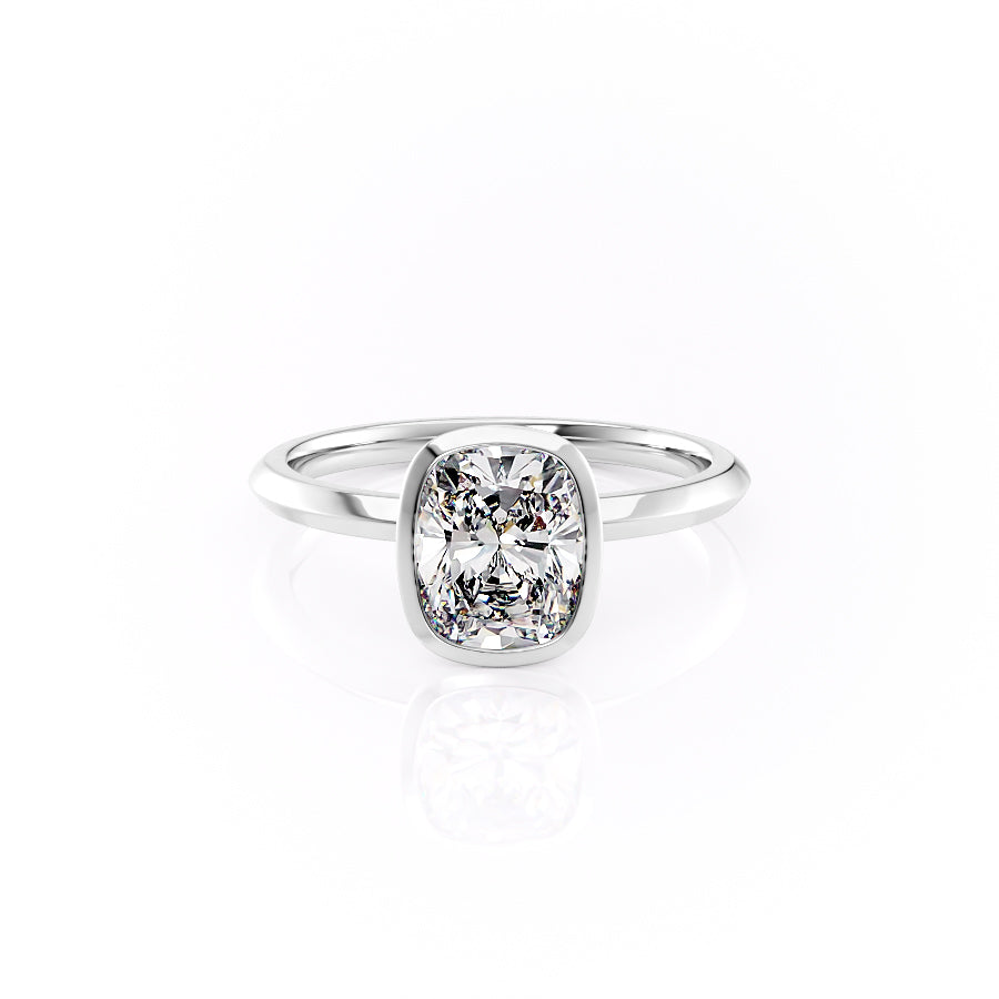The Razor Bezel Kamellie Set With A 4.5 Carat Elongated Cushion Moissanite