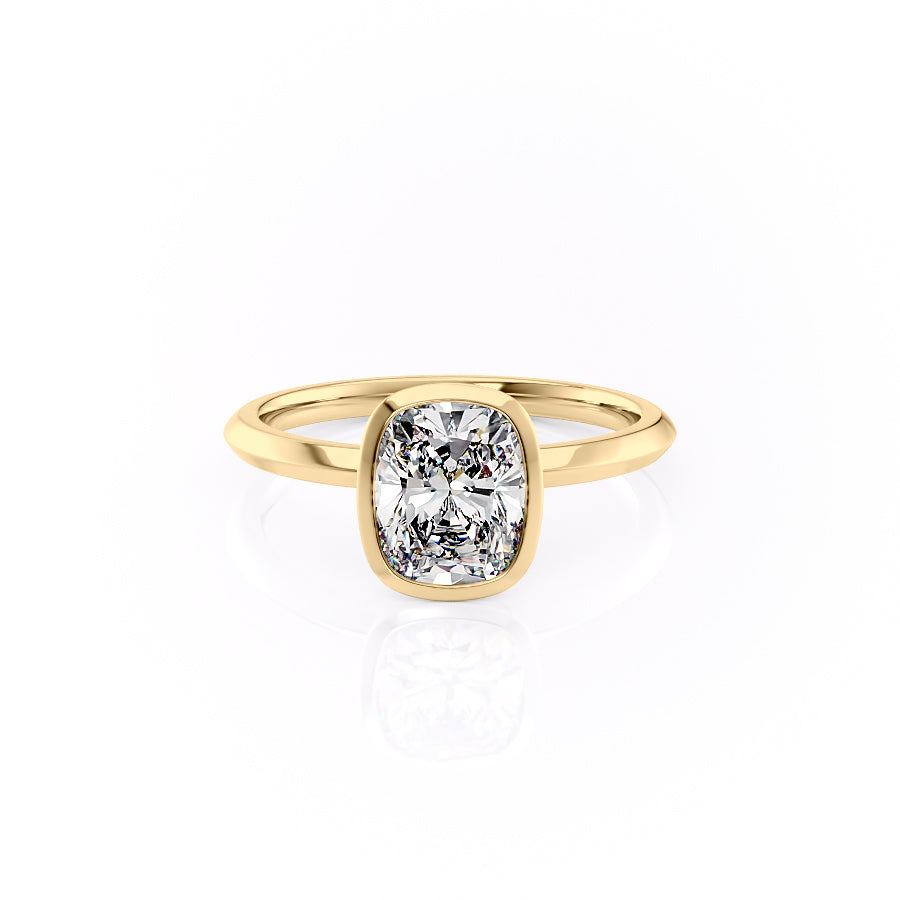The Razor Bezel Kamellie Set With A 2 Carat Elongated Cushion Moissanite