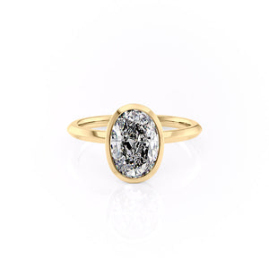 The Razor Bezel Kamellie Set With A 1.5 Carat Oval Moissanite