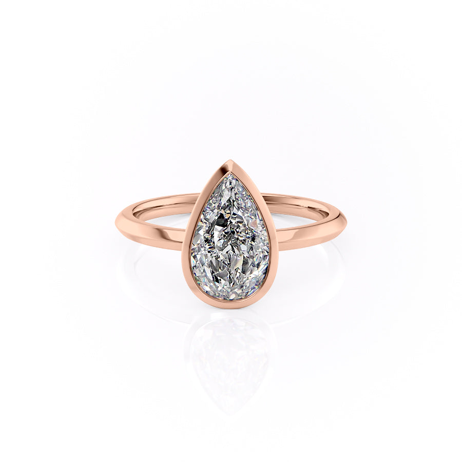 The Razor Bezel Kamellie Set With A 3 Carat Pear Moissanite