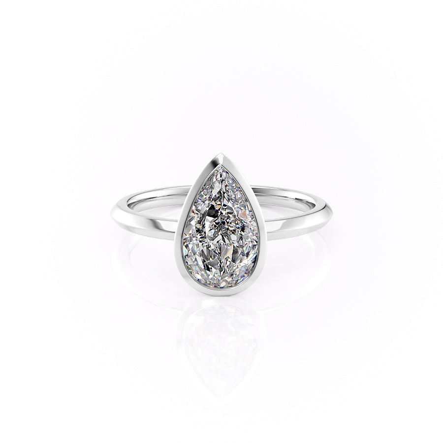 The Razor Bezel Kamellie Set With A 3 Carat Pear Moissanite