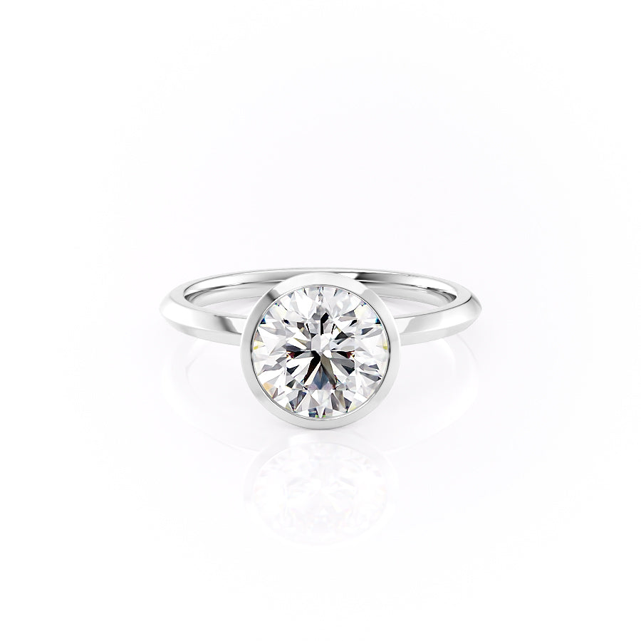 The Razor Bezel Kamellie Set With A 1 Carat Round Moissanite
