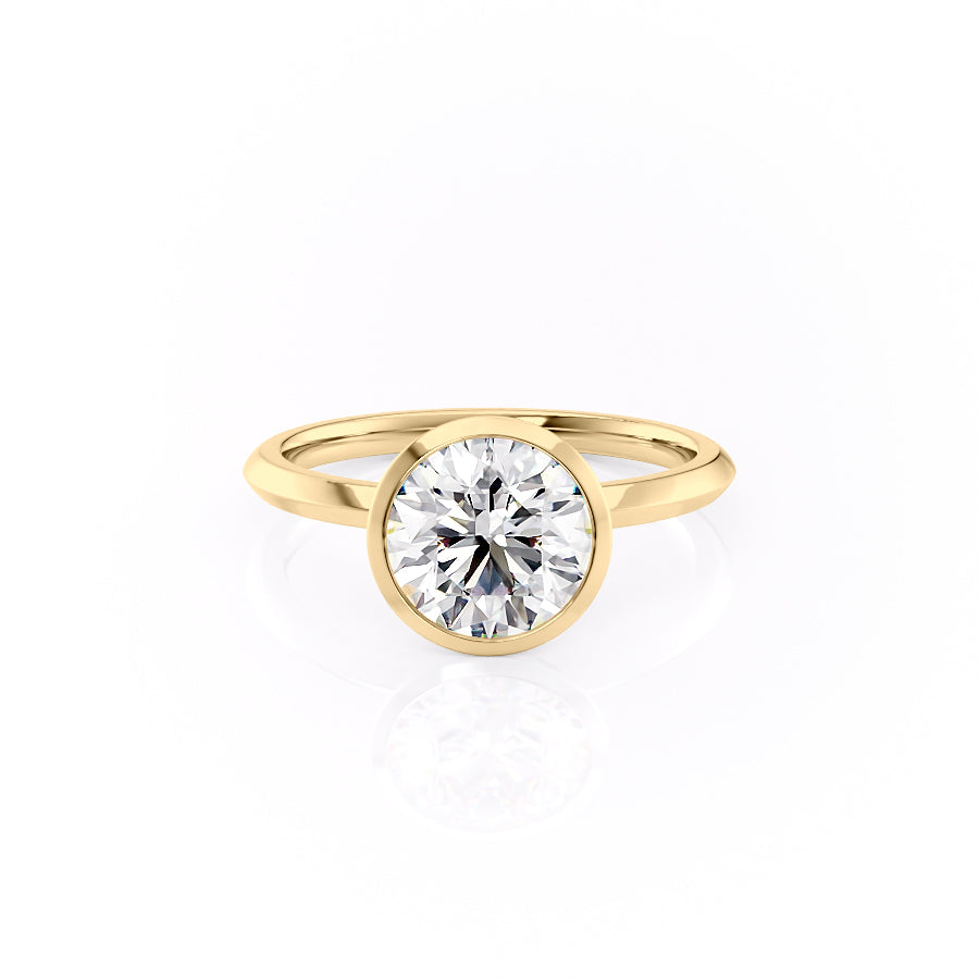 The Razor Bezel Kamellie Set With A 2 Carat Round Moissanite