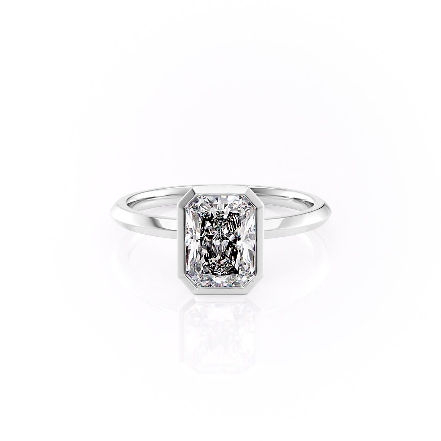 The Razor Bezel Kamellie Set With A 4.5 Carat Radiant Moissanite